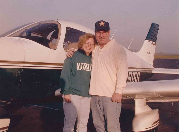 Janet and Charles Magee together in front of their plane. Collection 9/11 Memorial Museum, Gift of Janet Magee in memory of my husband Charlie Magee.