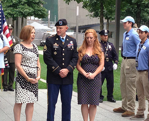 9/11 Memorial Museum Director Alice Greenwald stands next to Ty and Shannon Carter on Memorial plaza. Ty Carter is wearing a formal Army uniform.