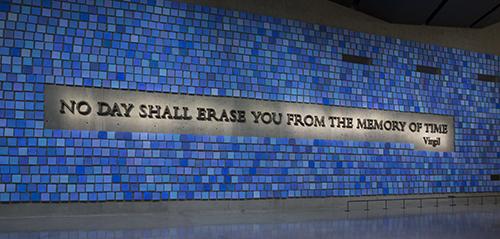 Artist Spencer Finch’s Memorial Hall installation “Trying to Remember the Color of the Sky on That September Morning” is seen in Memorial Hall. The installation includes 2,983 watercolor squares, each in its own shade of blue, and the Virgil quote, “No day shall erase you from the memory of time.”