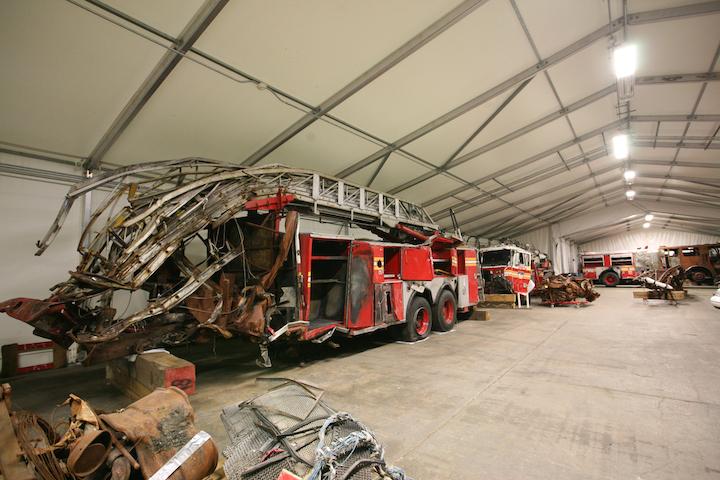 A view inside Hangar 17 at John F. Kennedy International Airport shows damaged FDNY fire trucks and other relics from the 9/11 attacks.