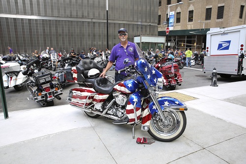 Ted Sjurseth with his bike. Collection 9/11 Memorial Museum, Gift of the Ted Sjurseth family.