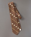 Necktie, collection of the 9/11 Memorial Museum, gift of the family of Alfonse Niedermeyer. Photo by Michael Hnatov. 