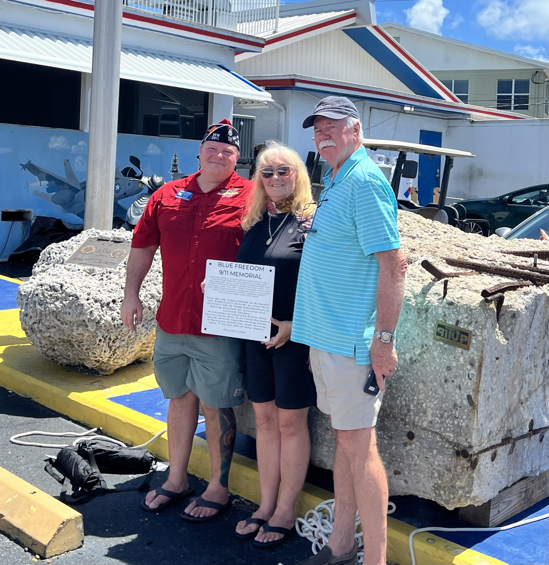 Chris Green, Sandra Priest, artist and Bob Holston in 2022 on dedication day placement in Key West.