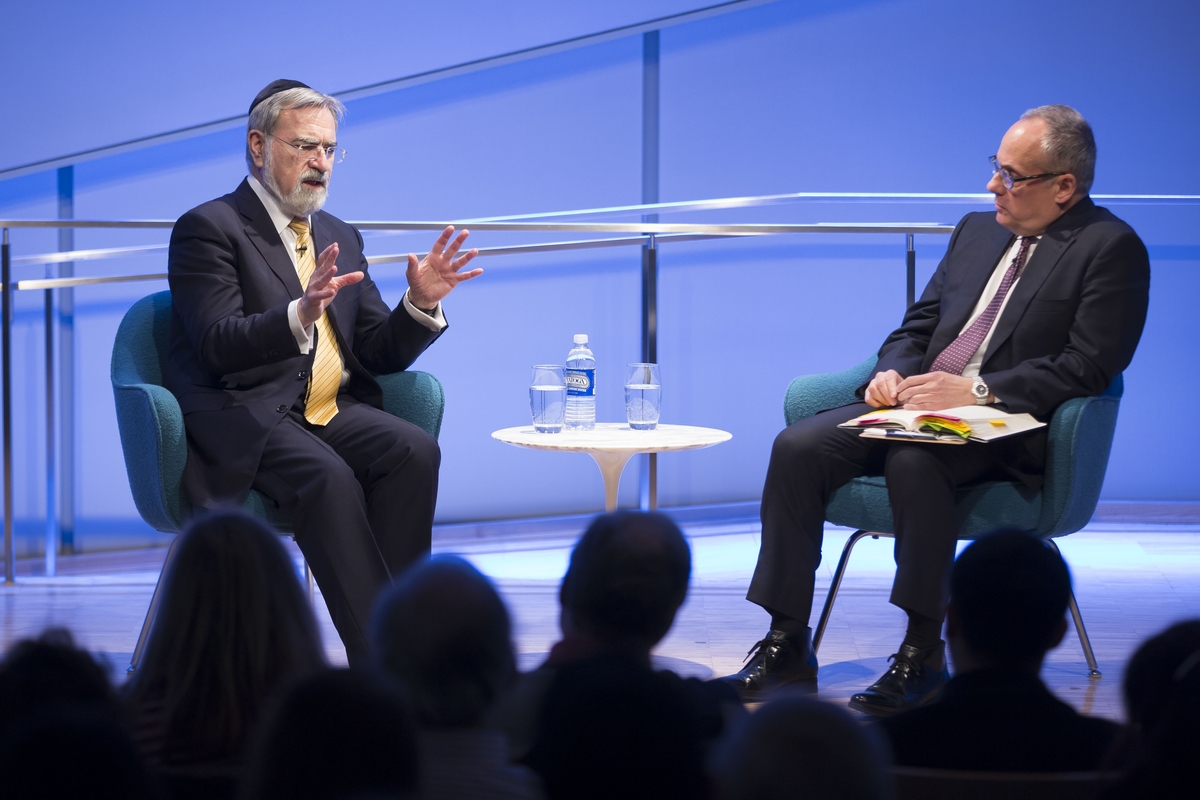 Rabbi Lord Jonathan Sacks speaks onstage at the Museum Auditorium as he sits alongside Clifford Chanin, the executive vice president and deputy director for museum programs.