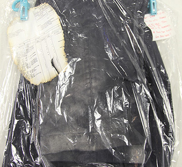 A pair of dusty black pants from 9/11 donated by Greg Gully are seen in a plastic bag at the Museum.