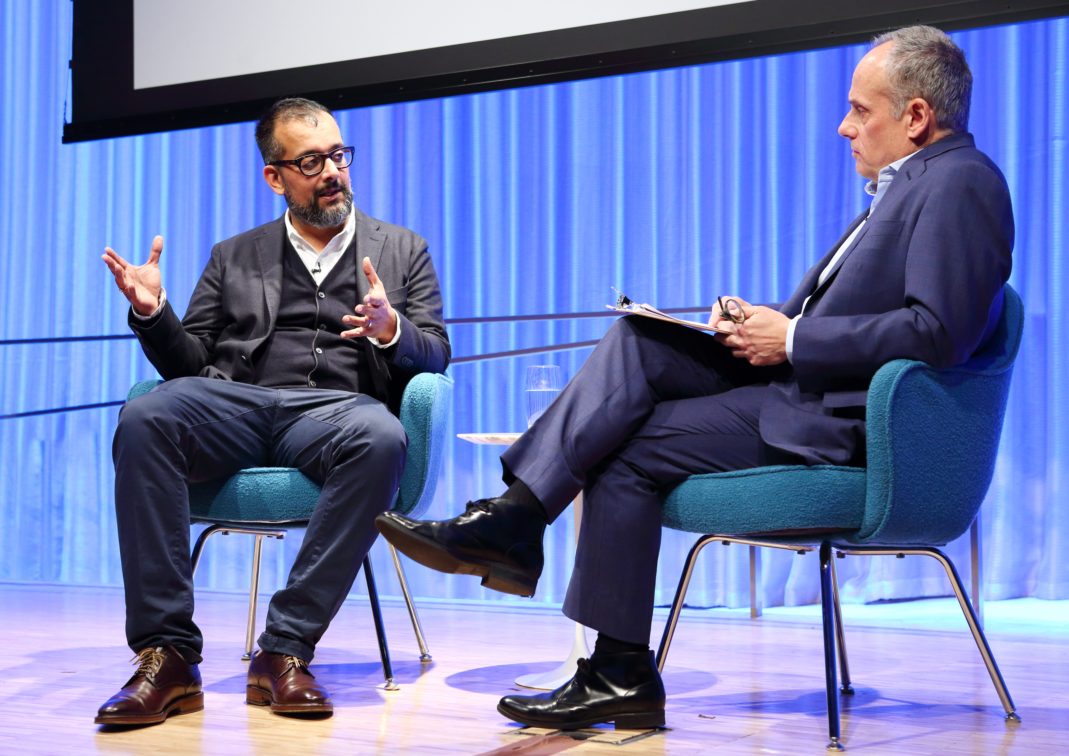 Vice co-founder Suroosh Alvi gestures as he speaks with Clifford Chanin, executive vice president and deputy director for museum programs, onstage during a public program at the Museum auditorium.