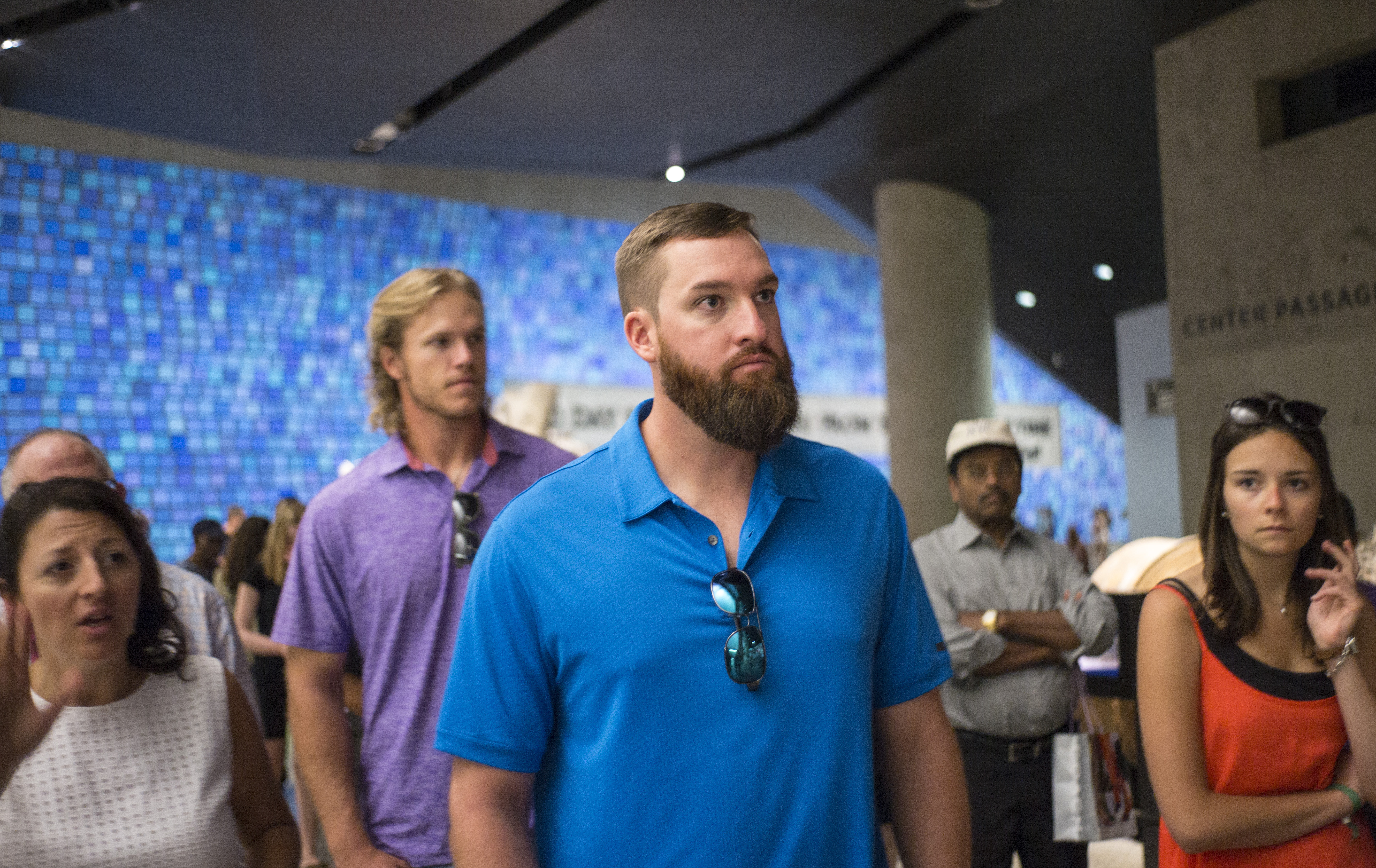 Bobby Parnell, the former Mets pitcher, visits the 9/11 Memorial Museum. Other visitors stand behind him.