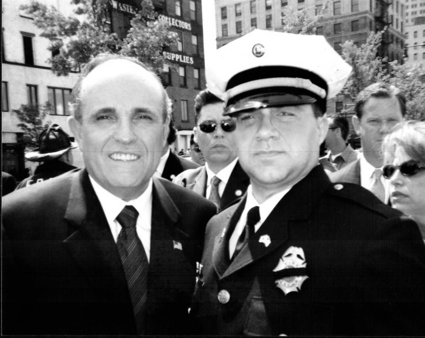 In this photo from 2002, Mayor Rudy Giuliani and Thomas Bowen walk along the West Side Highway after taking part in the Last Column escort.