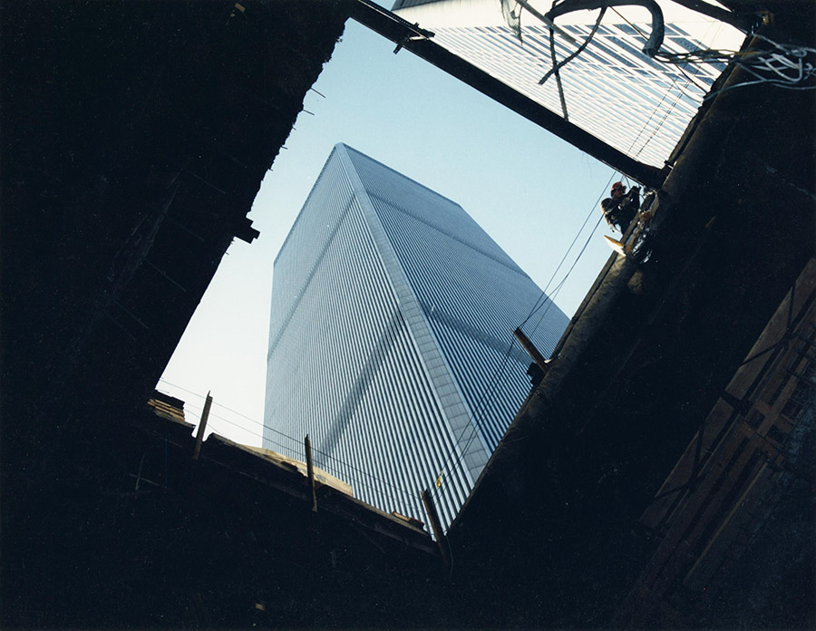 One of the Twin Towers rises into the sky in a photograph taken from the bomb crater created by the 1993 World Trade Center bombing.