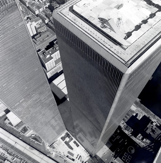 This black-and-white photo from 1973 shows a view from above looking down at the newly finished Twin Towers.
