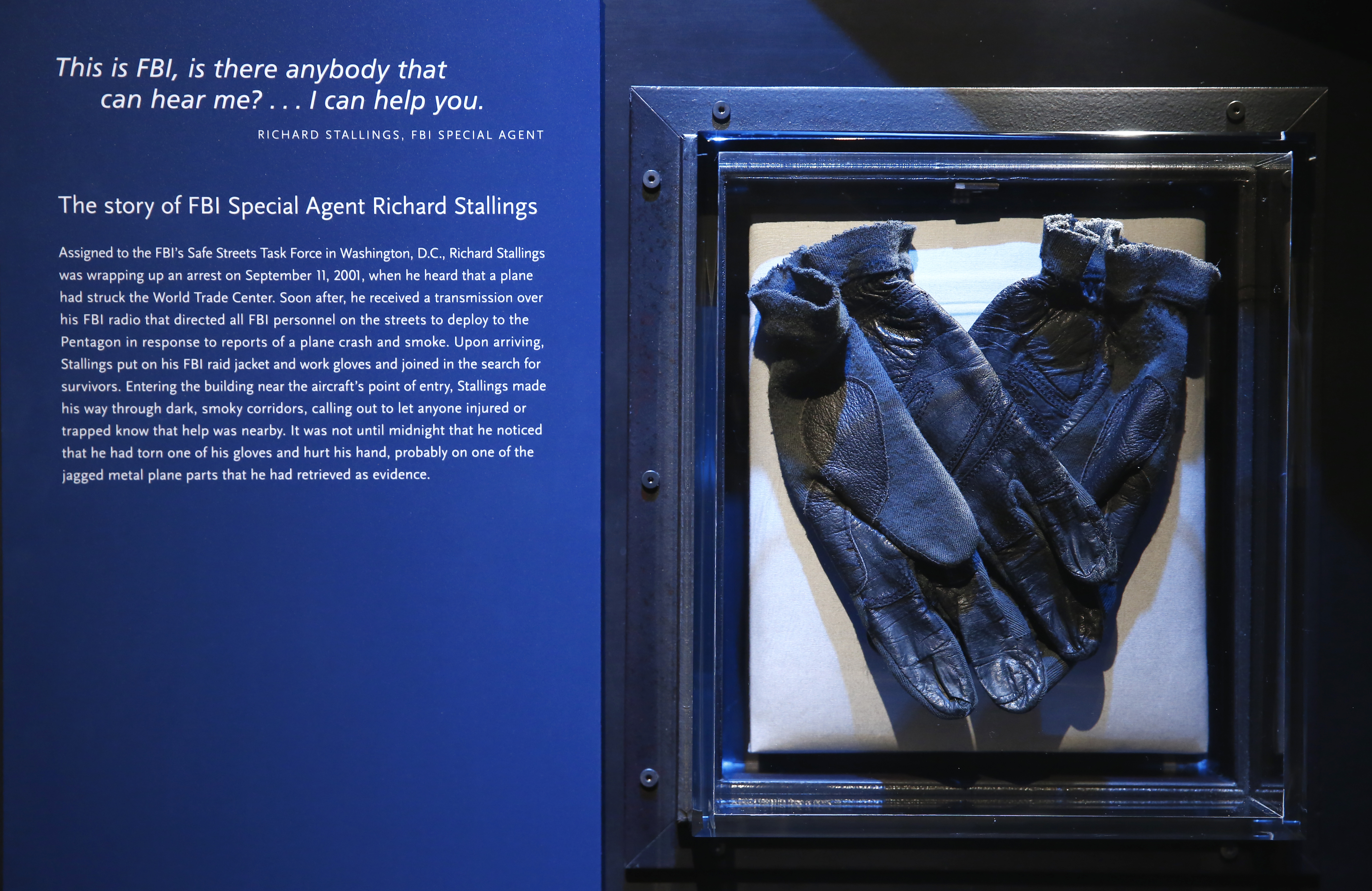The black leather gloves worn by FBI agent Richard Stallings are displayed in the Museum with informational text.