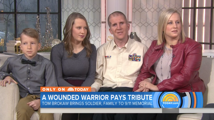 Corey Briest, a National Guard veteran who sustained a traumatic brain injury in Iraq, is seen with his wife, daughter, and son during an interview on the Today show at the NBC studios at Rockefeller Center.