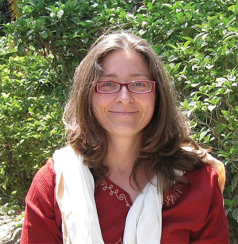 Georgetown University professor and political scientist C. Christine Fair poses for a photo outside.