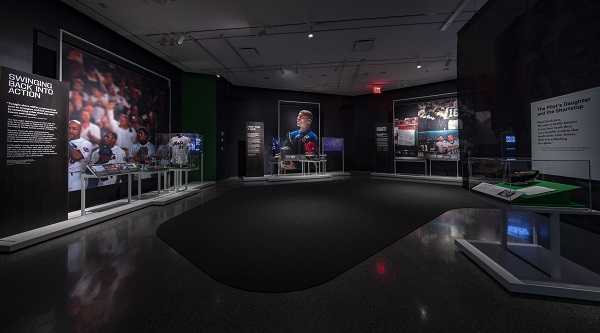 A panoramic photo shows the exhibit, “Comeback Season: Sports After 9/11.”