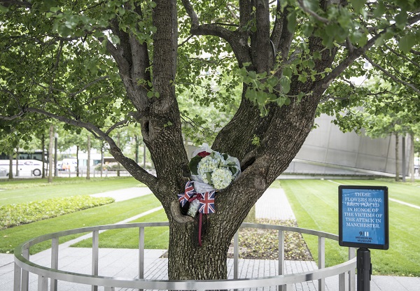 A tribute made up of flowers and British flags have been placed at the Survivor Tree following terrorist attacks in the United Kingdom.