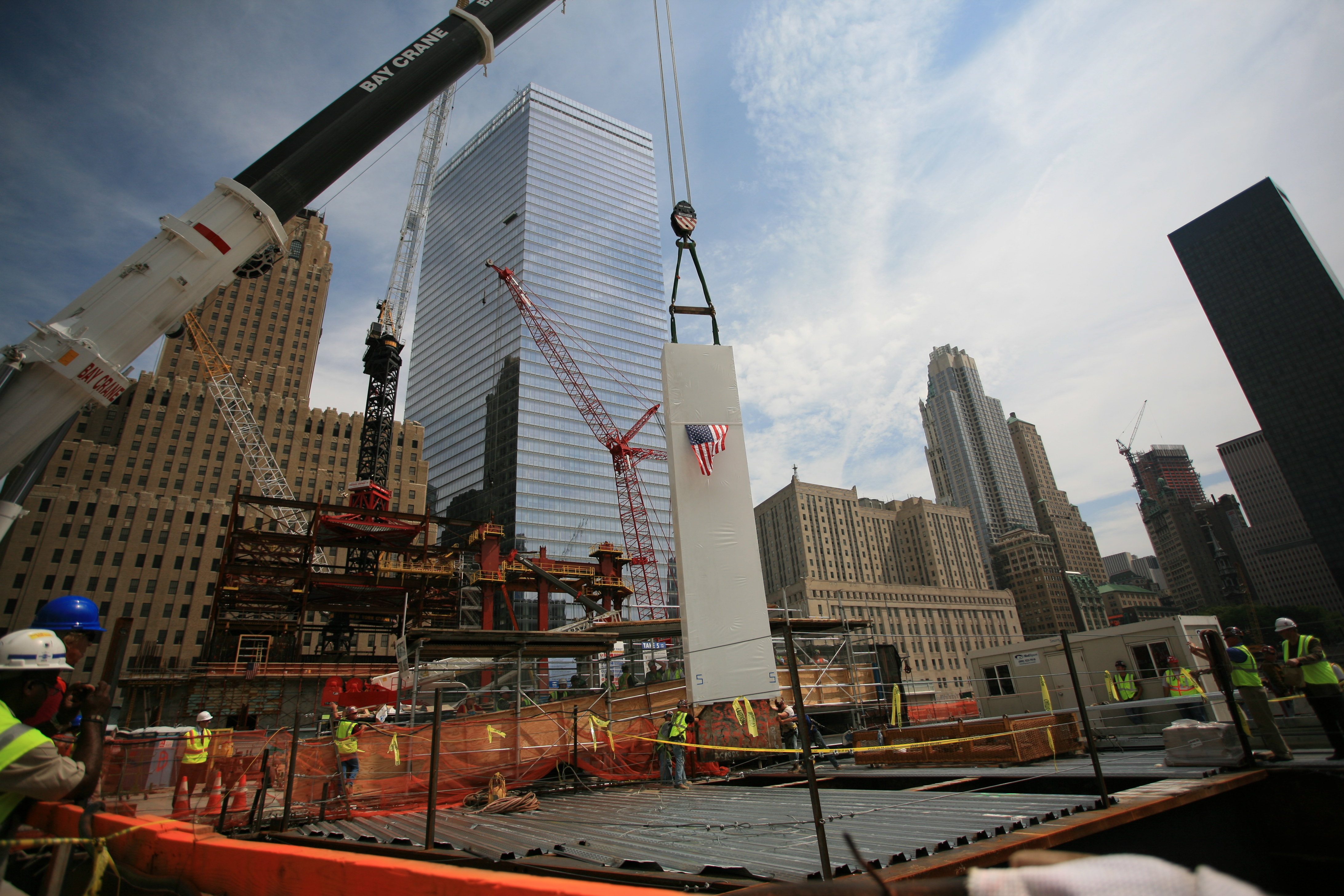 The Last Column is lowered into the 9/11 Memorial Museum by a crane on August 24, 2006.