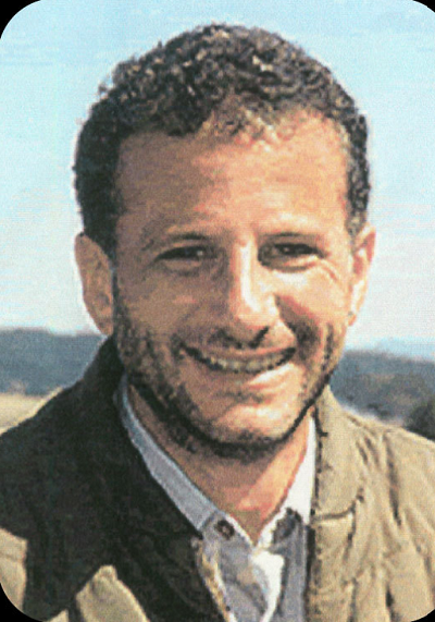 Richard Guadagno, a lover of the outdoors who worked as a manager at the U.S. Fish and Wildlife Service, smiles for a portrait photograph on a hillside. He was on Flight 93.