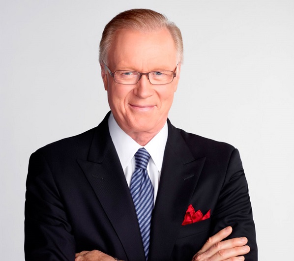 NBC New York anchor Chuck Scarborough poses for a portrait in a suit and tie.