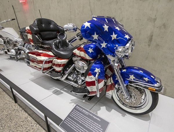 Ted Sjurseth’s tribute motorcycle is displayed at the Museum’s Tribute Walk. The motorcycle is emblazoned with the stars and stripes of the American flag.