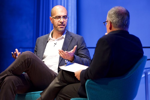 Author Haroon Moghul speaks with Clifford Chanin, executive vice president and deputy director for museum programs, onstage during a public program at the Museum auditorium.