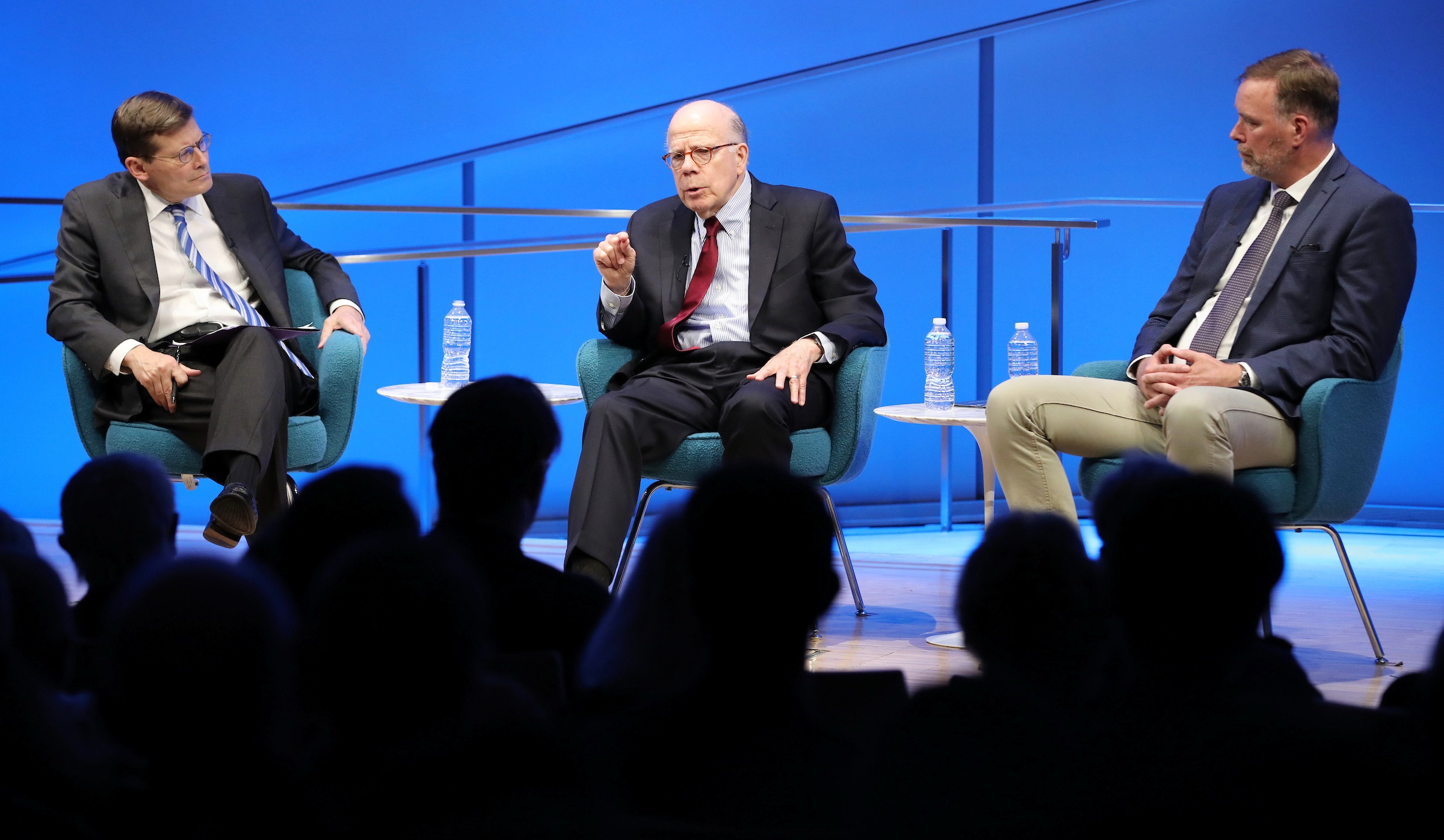 Former Acting CIA Directors John McLaughlin and Michael Morell and former CIA Senior Paramilitary Officer Phil Reilly participate in a public program onstage at the 9/11 Memorial Museum auditorium.