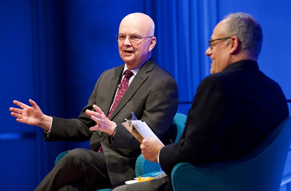 Gen. Michael Hayden gestures as he speaks with Clifford Chanin, executive vice president and deputy director for museum programs, onstage during a public program at the Museum auditorium.