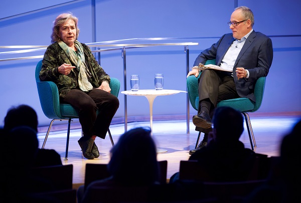 Professor Sheila Carapico speaks onstage at the Museum auditorium during a public program with Clifford Chanin, executive vice president and deputy director for museum programs.