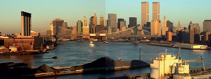A still image from a time-lapse compilation video by artist Wolfgang Staehle shows the skyline of Manhattan on the morning of September 11, 2001. The Twin Towers stand over lower Manhattan, the East River, and parts of Brooklyn on a sunny morning.