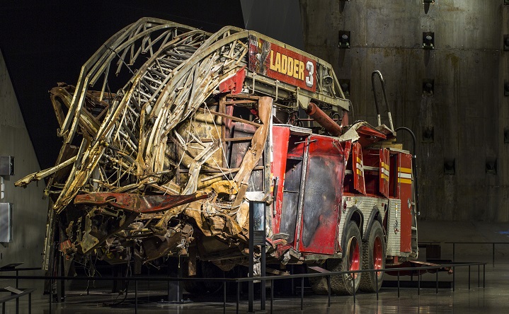 FDNY Ladder 3's truck, partially crushed, sits on display in the 9/11 Memorial Museum. 