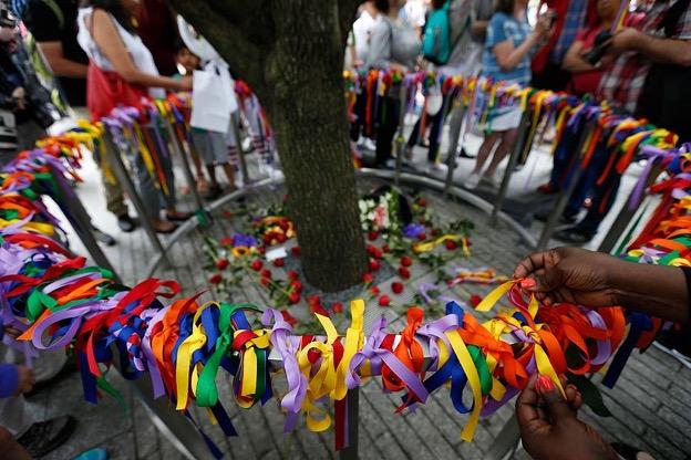 National September 11 Memorial & Museum - Flowers were placed at the Survivor  Tree on the 9/11 Memorial for the victims of the Manchester bombing. Our  thoughts and prayers are with the