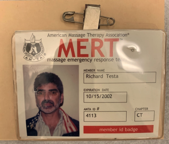 ID badge with photo, the organization name MERT in red letters, and the logo of the American Massage Therapy Association