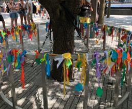 Colorful messages surrounding the Survivor Tree