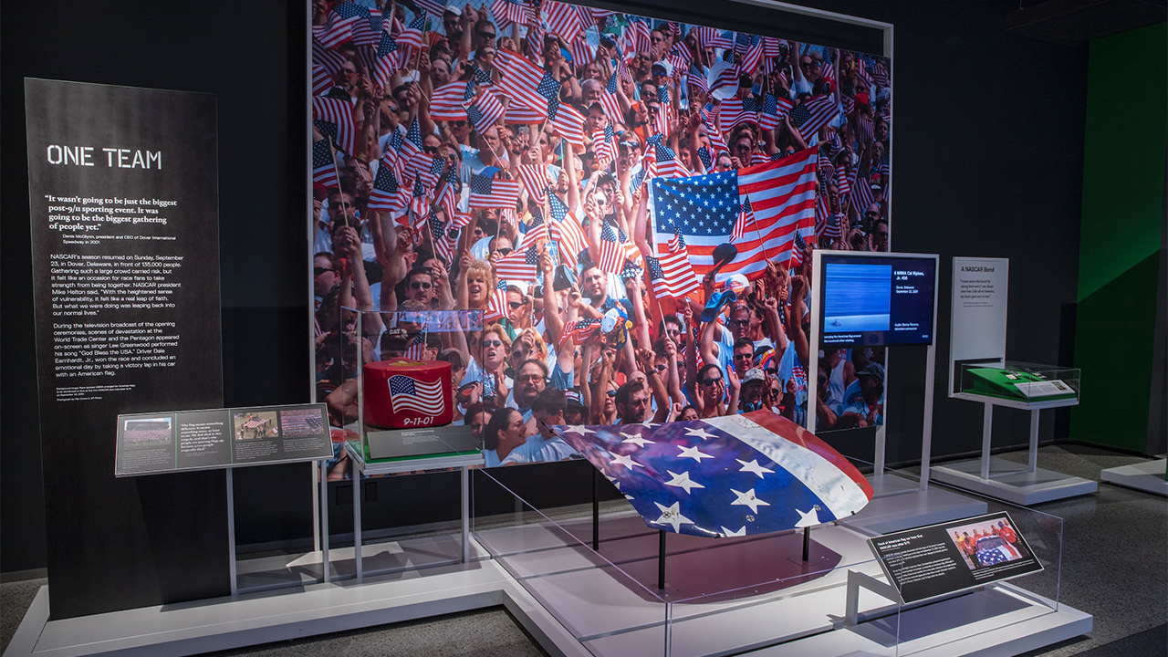 An American flag and other memorabilia is on display as part of the sports-themed exhibition Comeback Season: Sports After 9/11.