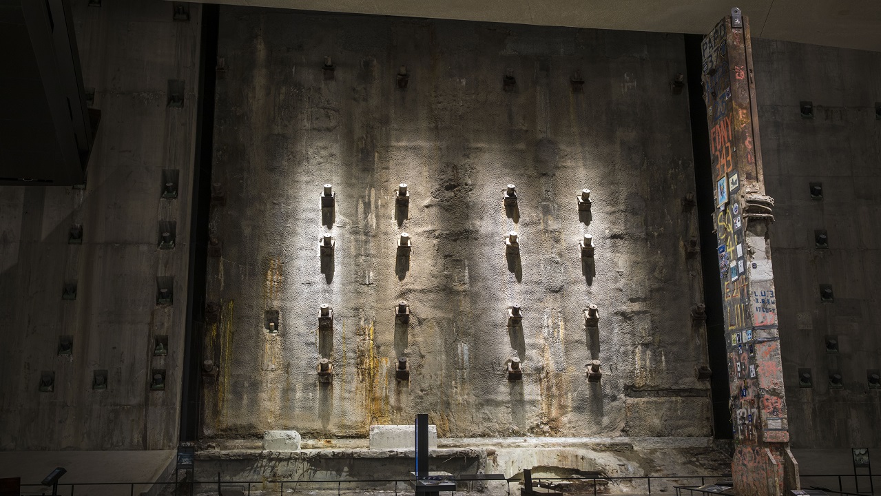The slurry wall illuminated in the 9/11 Memorial Museum.