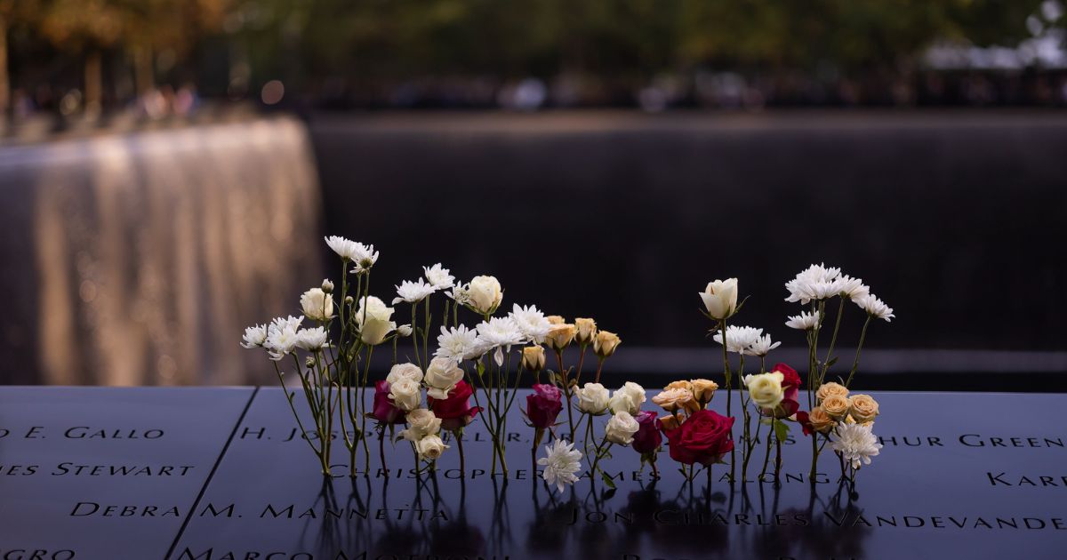 Flowers on the Memorial parapet