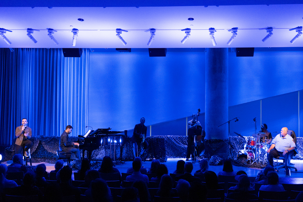dark blue stage is lit before the performance