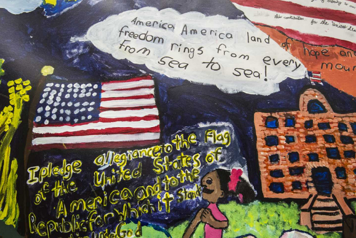 Detail shot of the children's mural, featuring an American flag and patriotic messages