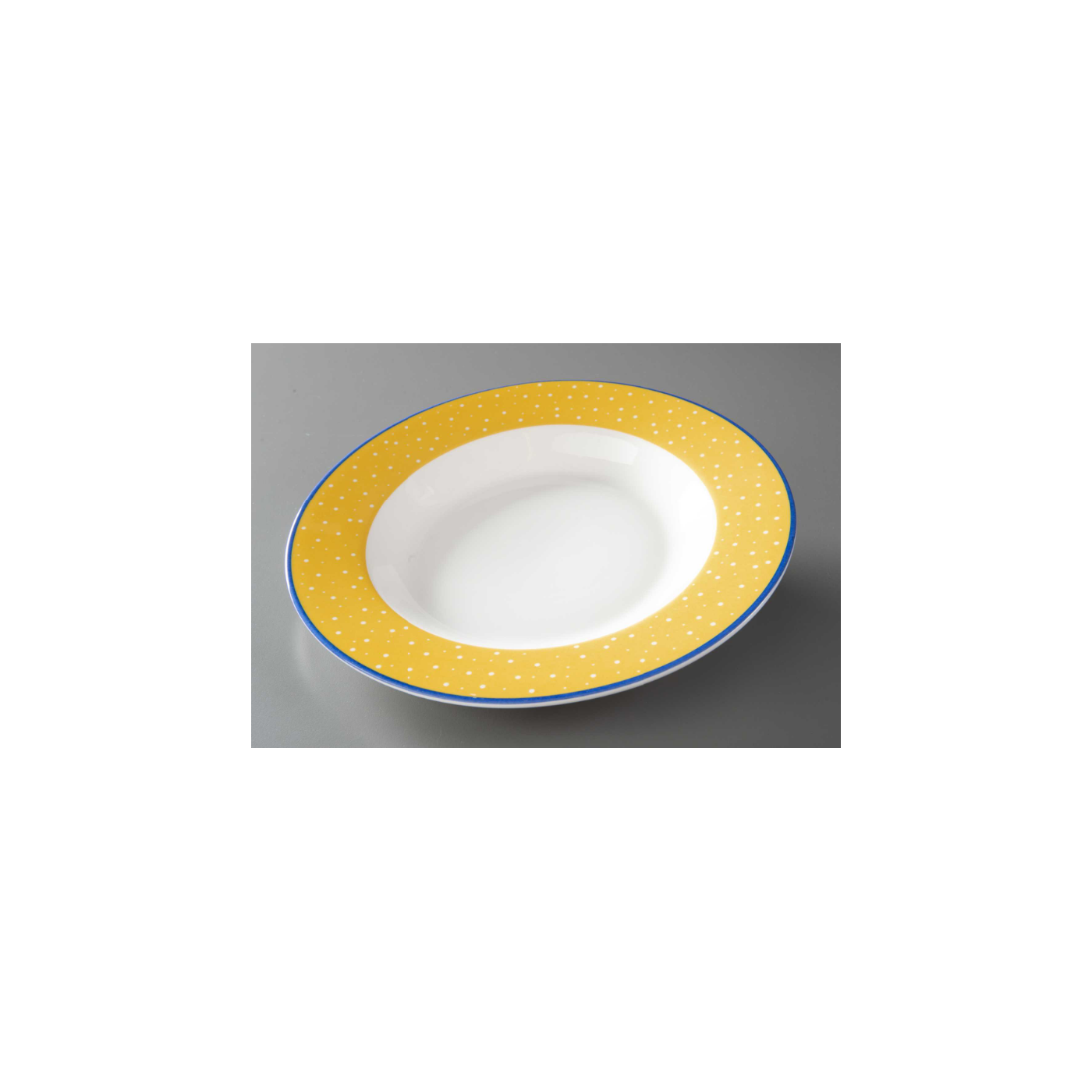 Soup bowl used at the Windows on the World restaurant. The bowl has a narrow blue trim and a wide yellow border with white dots representing stars.