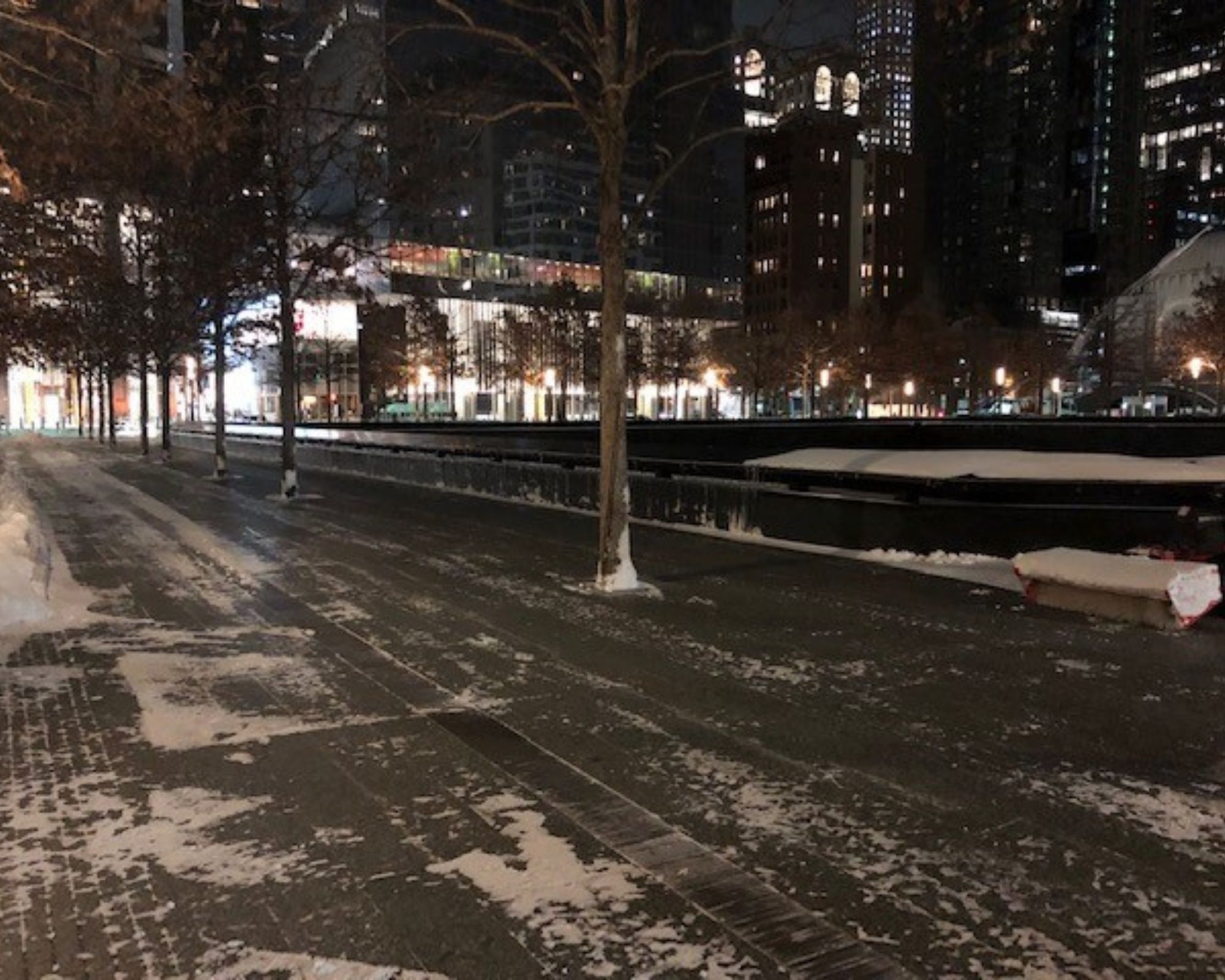 Nighttime on the plaza, with snow cleared away