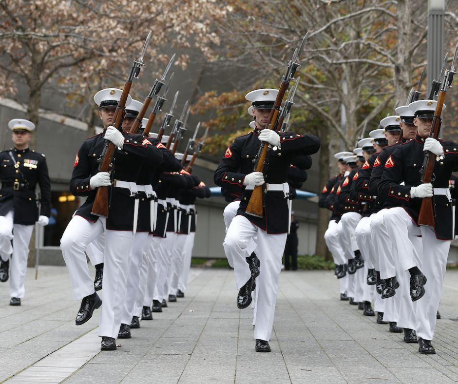 Marine Corps Silent Drill Team performs at the Memorial 
