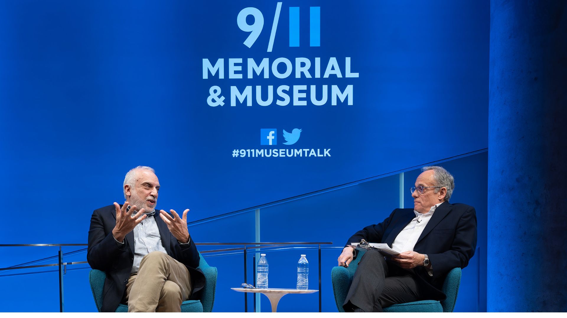 Soli Özel (left) speaks to Clifford Chanin at the Museum