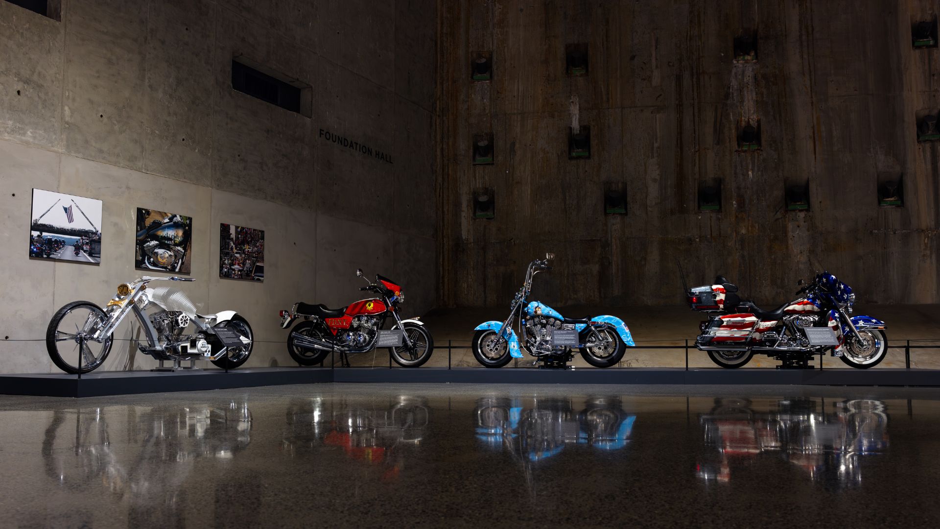 Four commemorative motorcycles lined up on display at the Museum