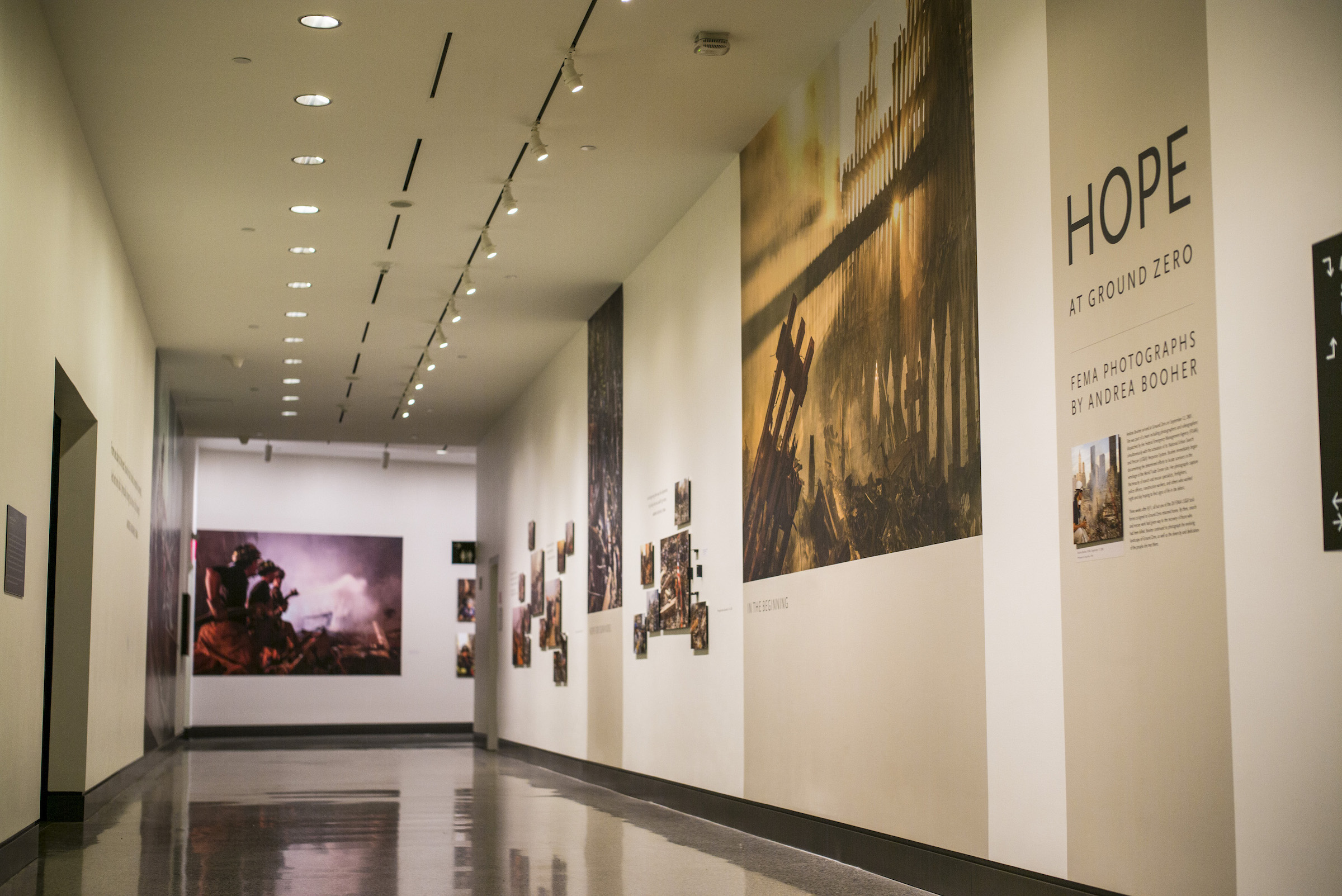 A collection of photographs documenting the work of dedicated men and women at Ground Zero after 9/11 are displayed as part of the exhibition Hope at Ground Zero: FEMA Photographs by Andrea Booher. 