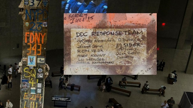 An image of the Last Column zooms on signatures written by members of the New York City Department of Design and Construction. The words “DDC Response Team” are above about a dozen signatures written on the column’s steel. 