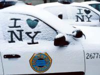 "I love NY" in snow on a Des Moines Police Car.
