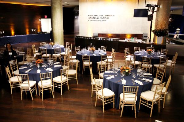 Wide lens shot of round tables set in the Atrium Lobby