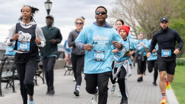 5K runners mid-race along the water
