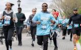 5K runners mid-race along the water