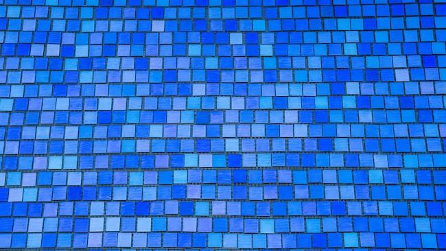 Detail of blue tiles in different shades, from the Spencer Finch wall at the Museum
