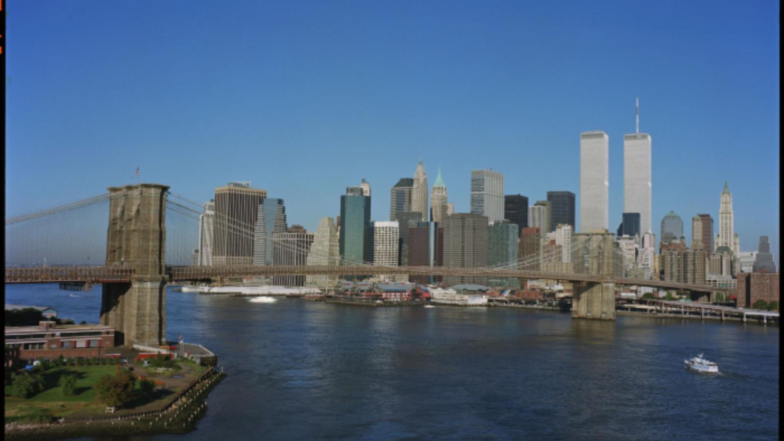 View of 2001NYC skyline including the Brooklyn Bridge and the East River